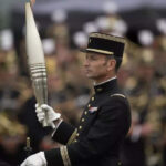 Olympic Torch Relay: France’s Bastille Day parade meets the Olympic torch relay in an exceptional year