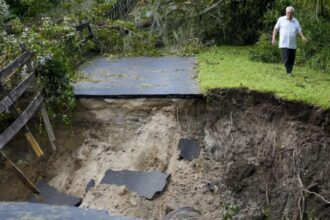 Residents slog through flooded streets, clear debris after Hurricane Milton tore through Florida Residents slog through flooded streets, clear debris after Hurricane Milton tore through Florida