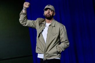 Eminem: ‘Spotlight is on us’: Eminem introduces Obama at Detroit event