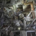 Russian bomb hits residential building in Ukraine’s 2nd largest city, killing 12-year-old boy