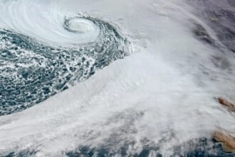 Bomb cyclone hits northwest US, causing major disruptions; power outages affect thousands