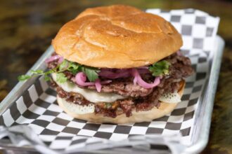 ‘No burgers, soft drinks and burgers’: UK bans daytime TV ads for junk food in bid to tackle child obesity