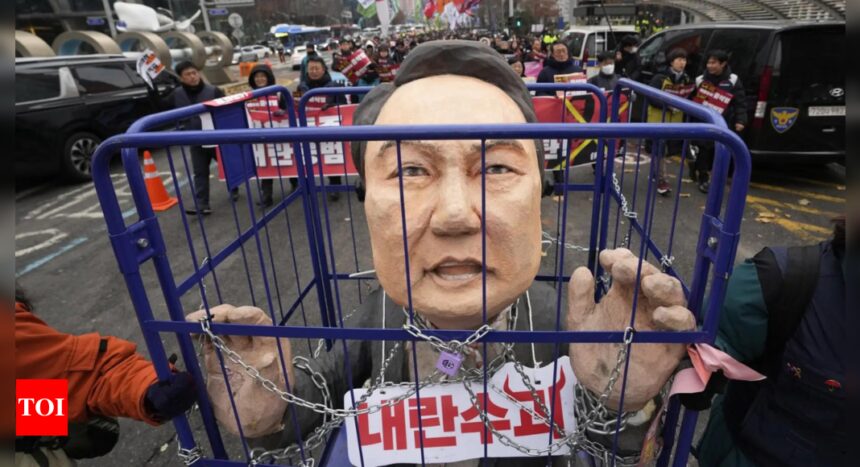 South Korean authorities seek warrant to detain impeached President Yoon in martial law probe