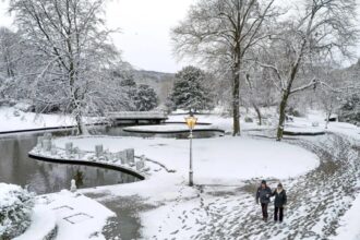 Snow across England causes disruption for air travellers